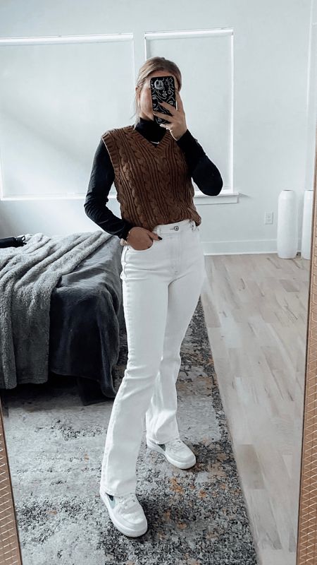 Long sleeve Nike top with brown cable knit sweater vest and white straight leg Abercrombie pants with green and white air-force one’s

#LTKshoecrush #LTKstyletip #LTKworkwear
