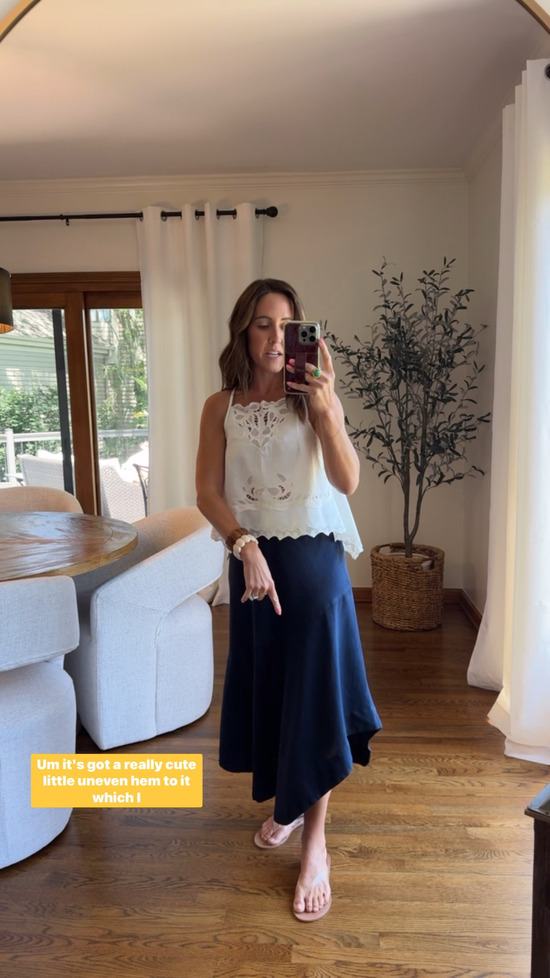 Cute asymmetric hem on this linen skirt. 
Navy here in XS. Comes in 2 more colors. 
Small tank. Linking a few more options as well.

#LTKSeasonal #LTKOver40 #LTKmomlife