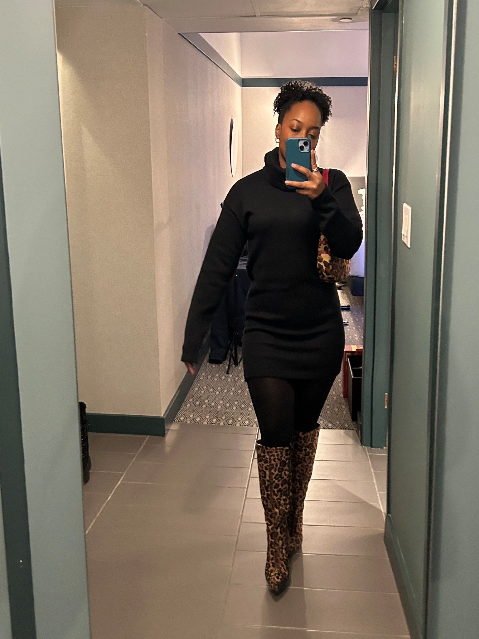 Winter date night ootd wearing this cute little black sweater dress from @Revolve! Styled with some statement boots and a leopard print bag. Wearing a size small. 

#LTKMidsize #LTKootd #LTKPetite
