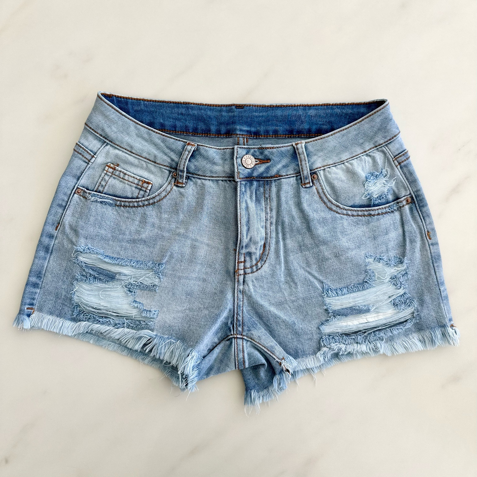 I’m stocking up for summer! ☀️
I absolutely love these ripped Jean shorts! Perfect color and fit! 

#LTKfindsunder50 #LTKfindsunder100