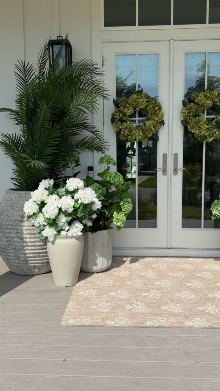 Loving the front door decor! These plants look so real! 

#LTKmomlife #LTKmorningroutine #LTKSeasonal