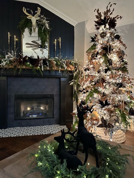 Christmas decor inspiration with a flocked Christmas tree, mantel garland, ornaments, reindeer and candles 

#LTKHoliday #LTKhome #LTKSeasonal