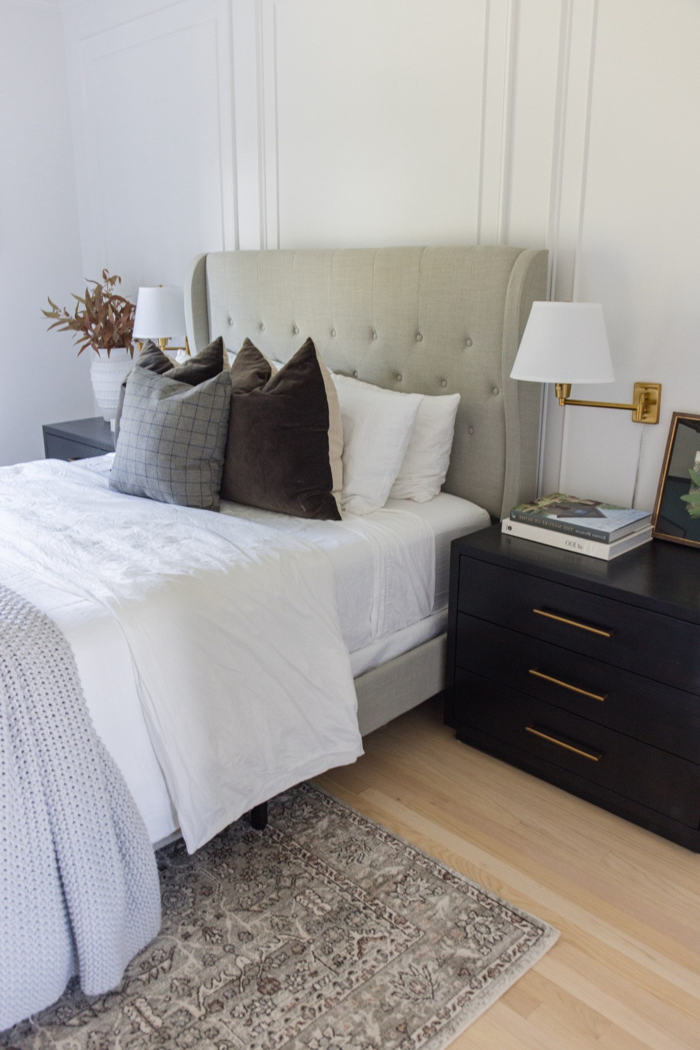 A view of our guest room, featuring my favorite swing-arm lamps and the prettiest pillows! 

#LTKHome #LTKSeasonal