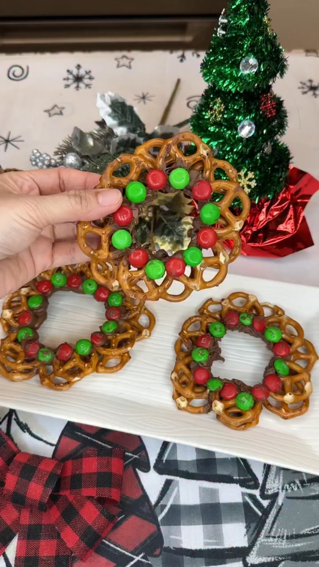 We enjoyed making these pretzel wreaths?! 🥨
So easy to make and that it doesn’t require baking!

Ingredients
• Mini Pretzels
• Mini chocolates
• M&M red and green color I used
•Parchment paper

Directions ⬇️
1) Melt your chocolate

2) Dip the bottom of each mini pretzel into the melted chocolate and arrange in a circle on the parchment paper.

3) Now, add a second layer of dipped pretzels.

4) Add the green and red M&M’s around. Let them set up and take a few minutes and enjoy!

❤️Like this post if you love this !
🛟Save for later and share it with your friends, sisters and friends!
➡️Follow me @simplypetiteray for more tips and recipes!

•
#holidaytreats #holidaysnacks #christmasdesserts #easyrecipesathome

#LTKHome #LTKHoliday