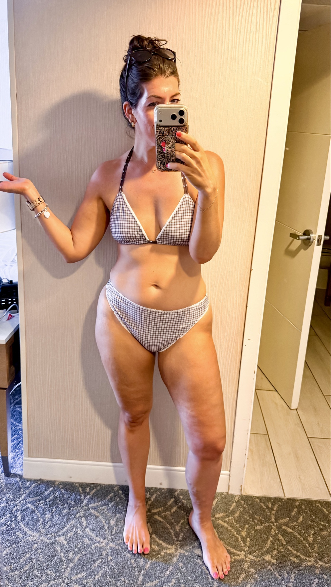 In a medium swim top and large swim bottom 

#LTKMidsize #LTKSwim #LTKSaleAlert