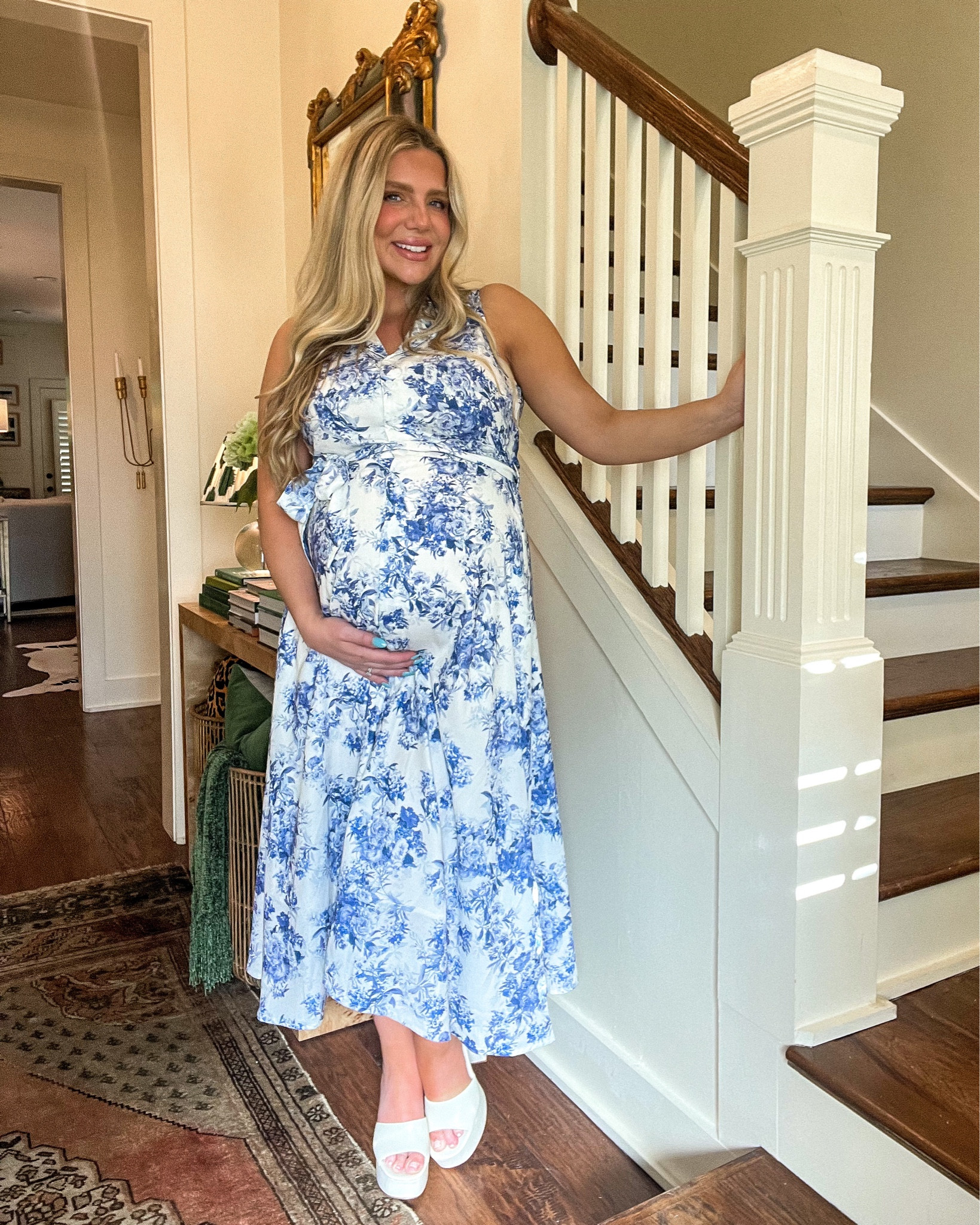 Literally obsessed with this sleeveless blue and white floral button up collared dress from Pink Blush Maternity! It looks so high end and blue and white floral is so on trend while also being incredibly classic. This particular one is currently out of stock on their site unfortunately but I linked it so you can sign up for restocks! BUT if you google image search I found a few other boutiques where it is in stock that I couldn’t link so def try that. Also linked tons of other similar options. Perfect for everything spring and baby boy, especially baby shower!! So similar to my shower dress but way more affordable. Paired here with my favorite white slip on heels, which are linked, but could also wear with white sneakers to dress it down. Wearing a large at 33 weeks pregnant here.

#LTKSeasonal #LTKunder100 #LTKbump