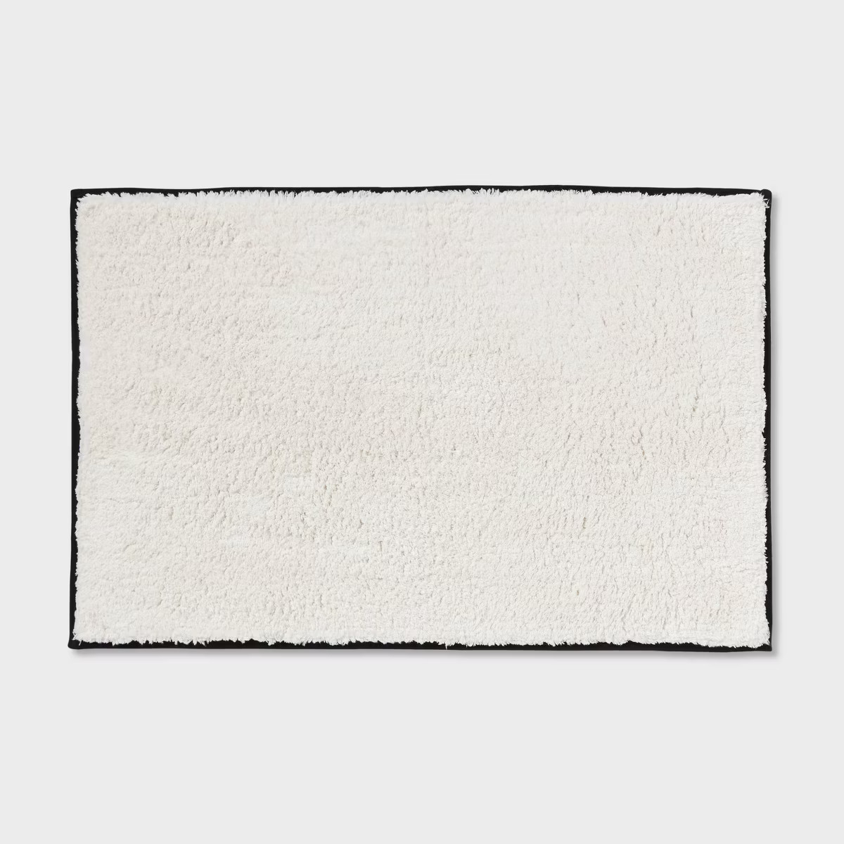 24"x36" Oversized Border Bath Rug Black/White - Threshold™ | Target