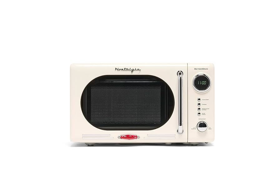 Nostalgia 0.7 Cu. Ft. Retro Compact Countertop Microwave Oven, Ivory | Amazon (US)