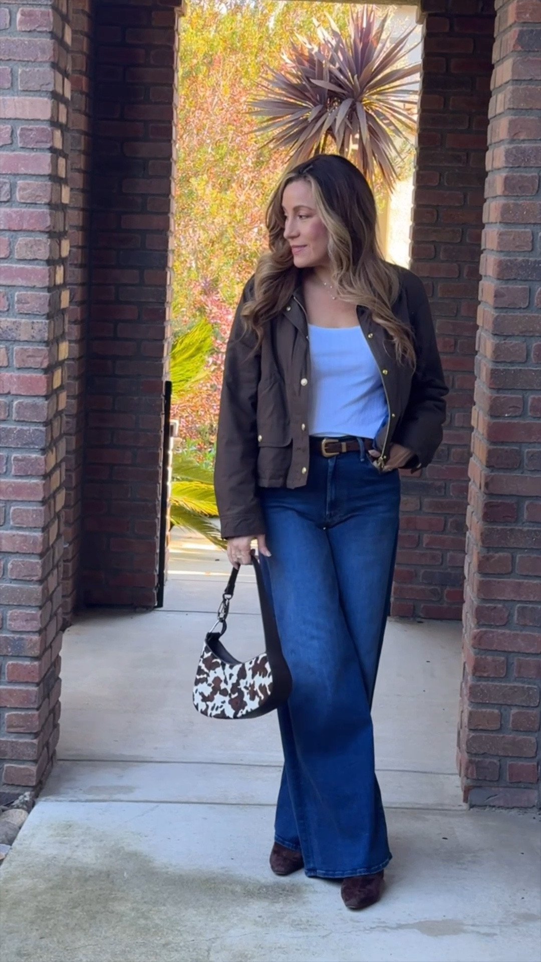 This is my kind of everyday outfit — comfortable, classic, and easy to wear.
The 100% cotton pointelle long-sleeve from Madewell is lightweight and breathable, layered with my favorite wool-blend barn jacket from J.Crew for that effortless, polished feel. I paired it with Mother Denim wide-leg jeans (so flattering) and suede brown boots to keep everything grounded and timeless.

This is such a great example of mixing soft basics with structured outerwear — perfect for errands, casual days, or anytime you want to feel put together without trying too hard.

🛍️ All pieces are linked and true to size.

⸻
#ootd #LTKStyleTip #LTKFind
#fallstyle #classicwardrobe #widelegjeans #barnjacket #everydayoutfit

#LTKOver40 #LTKTall #LTKootd