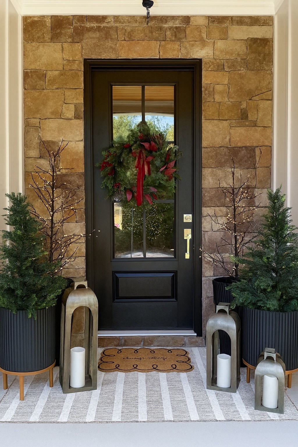I’m loving this year’s Christmas porch! These lit trees from Amazon are so magical at night! I’ve linked a very similar version of our wreath below under “similar”. I’m using last years Threshold wreath 🫶🏻

#LTKHome #LTKHoliday #LTKSeasonal