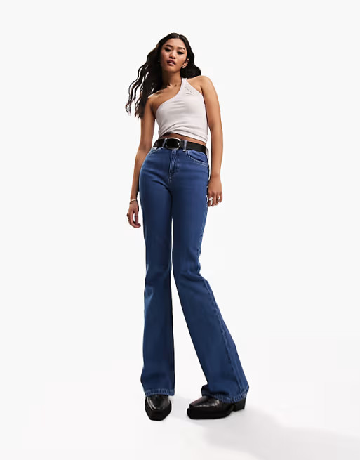 ASOS DESIGN flared jeans in mid blue | ASOS (Global)