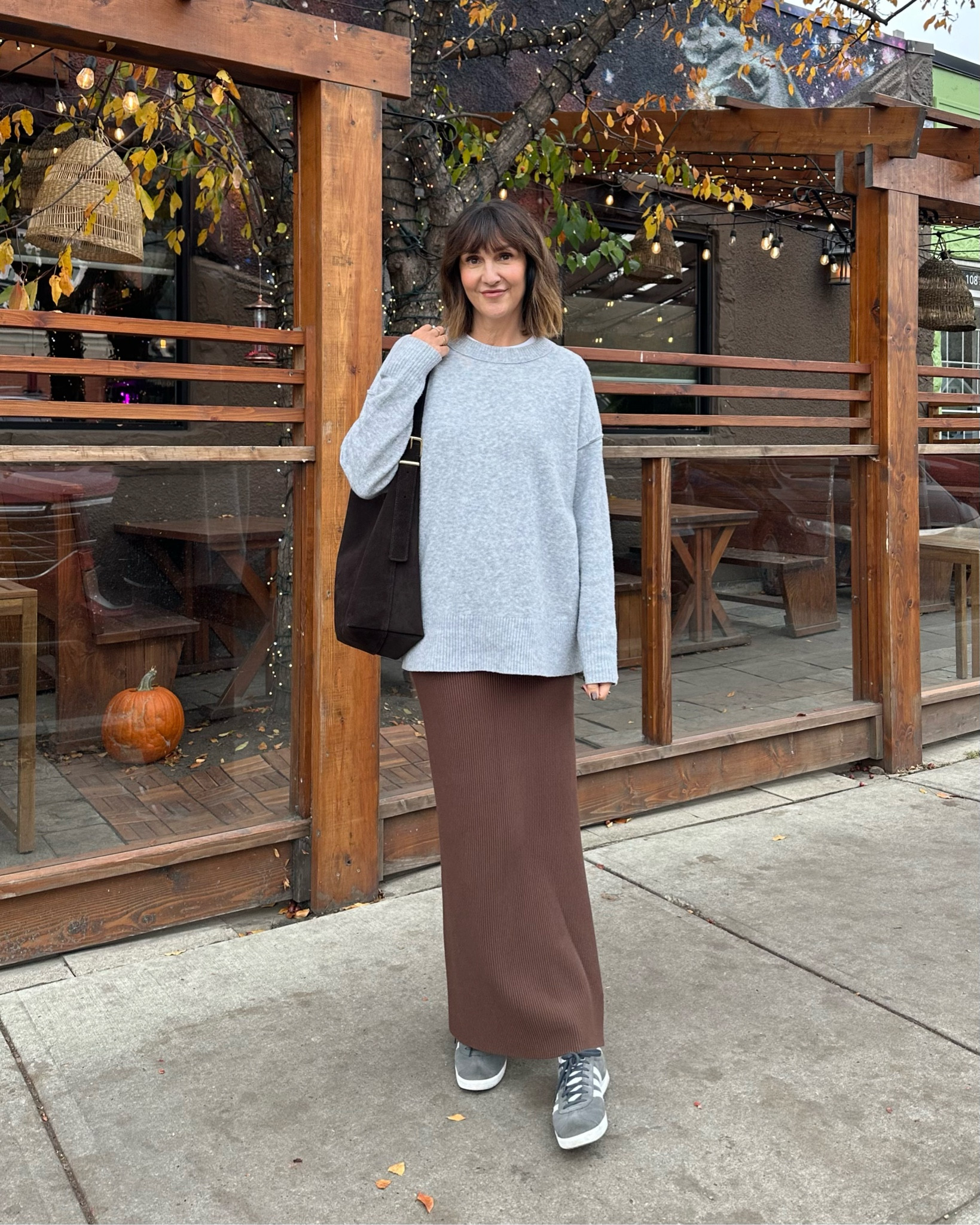 Brown and grey is such a good combo! 
I’m 5’ 7” wearing my usual S in this super stretchy and comfy skirt, comes in several colors. Size down 1/2 in women’s sizes for Adidas Gazelles and 1.5 if it’s men’s size. 
Also linked my brown suede bag I’ve been wearing so much lately. The strap is adjustable and can be worn cross body as well.
My sweater is old but I linked similar 


#LTKItBag #LTKStyleTip #LTKShoeCrush