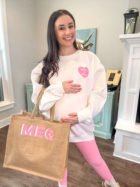 The cutest Valentines / Galentines gear from Sprinkled With Pink! I’m wearing a large sweatshirt for extra length and bump coverage at 24 weeks pregnant! The jute tote is the perfect size for an everyday bag. Would be so cute for hostess/bridesmaids gift! #galentinesday #personalizedsweatshirt #mamasweatshirt 