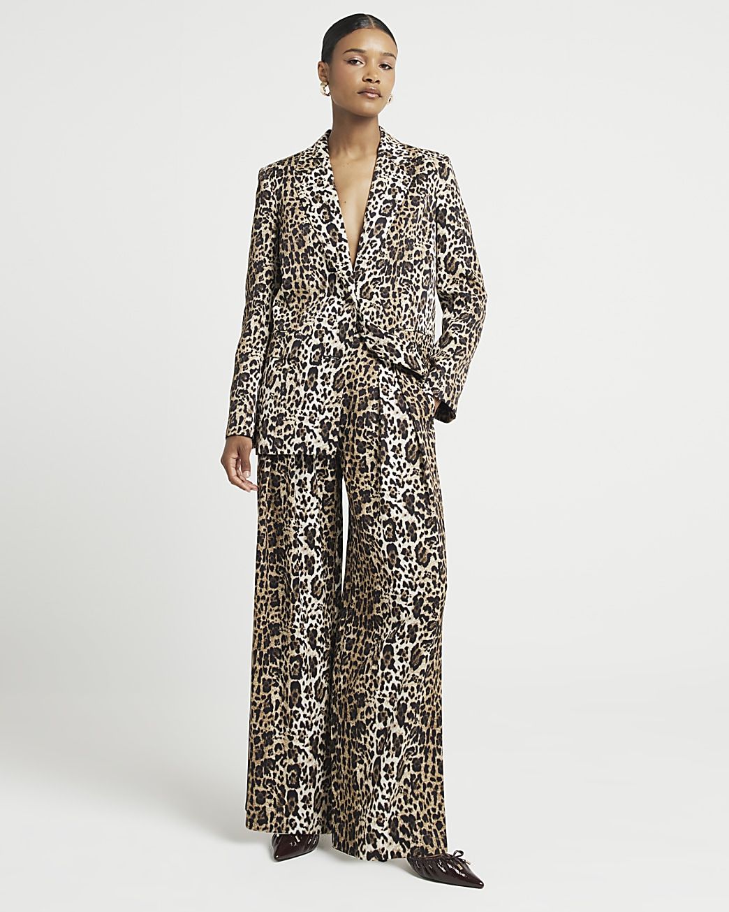 Brown leopard print wide leg trousers | River Island (UK & IE)