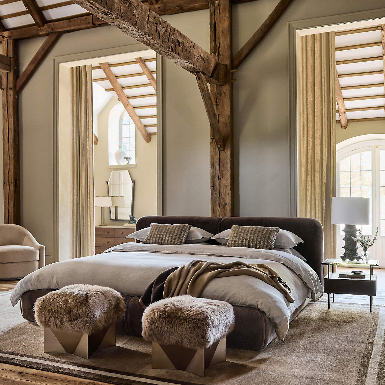 Rhea Pouf Ottoman by Jeremiah Brent + Reviews | Crate & Barrel | Crate & Barrel