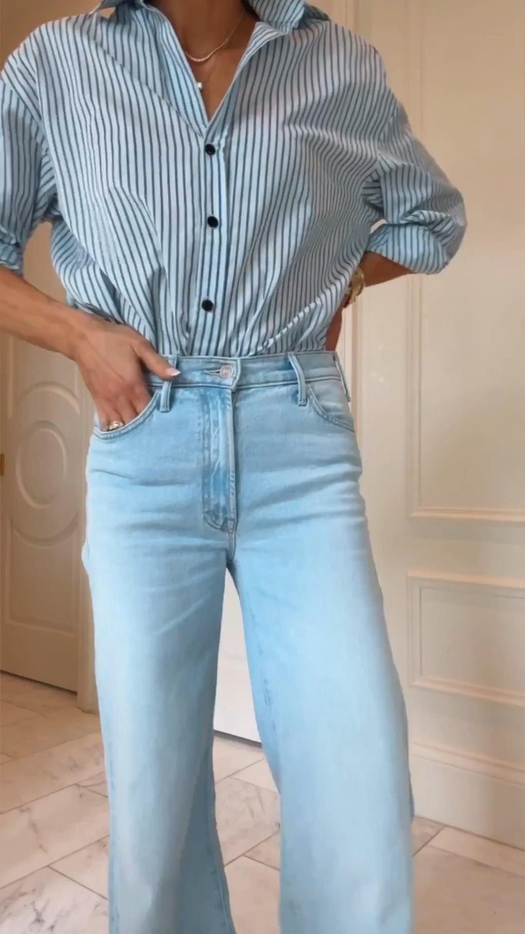 The jeans everyone is talking about! I'm 5'7 here and showing both the petite and regular sizes on. Jeans fit tts wearing size 25 in both.