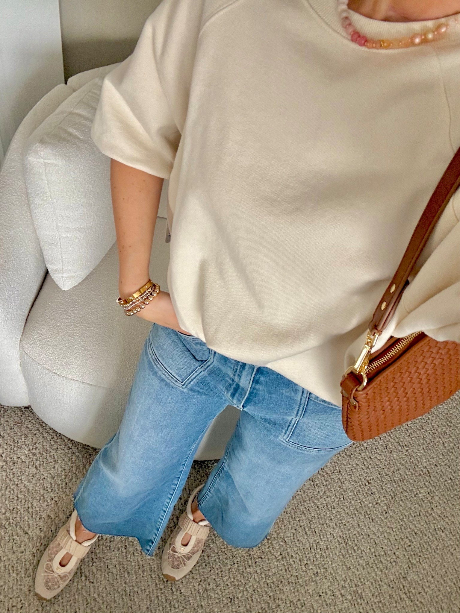 Casual trendy Spring outfit! 
Highly recommend these jeans! A splurge but fit so good!

Free People sweatshirt top (size down, xs)
Paige jeans (tts)
Maryjane sneakers (tts)
Quince bag 

#LTKmomlife #LTKOver40 #LTKootd