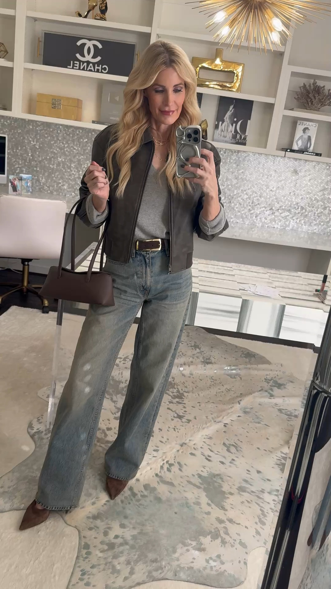 ✨ Outfit of the Day ✨
This V-neck cashmere sweater is such a standout—so soft, so flattering, and the price point is incredible from Quince 🙌🏼 Paired it with my go-to high-waisted wide-leg jeans (I’ve been reaching for these nonstop lately), and topped it off with this chic gray bomber jacket that looks like real leather but is actually faux—such a great find.

Everything runs true to size: wearing an XS in the sweater and jacket, and a 24 in the denim.

Effortless, elevated, and perfect for everyday 🤍



#LTKootd #LTKOver40 #LTKdayinmylife