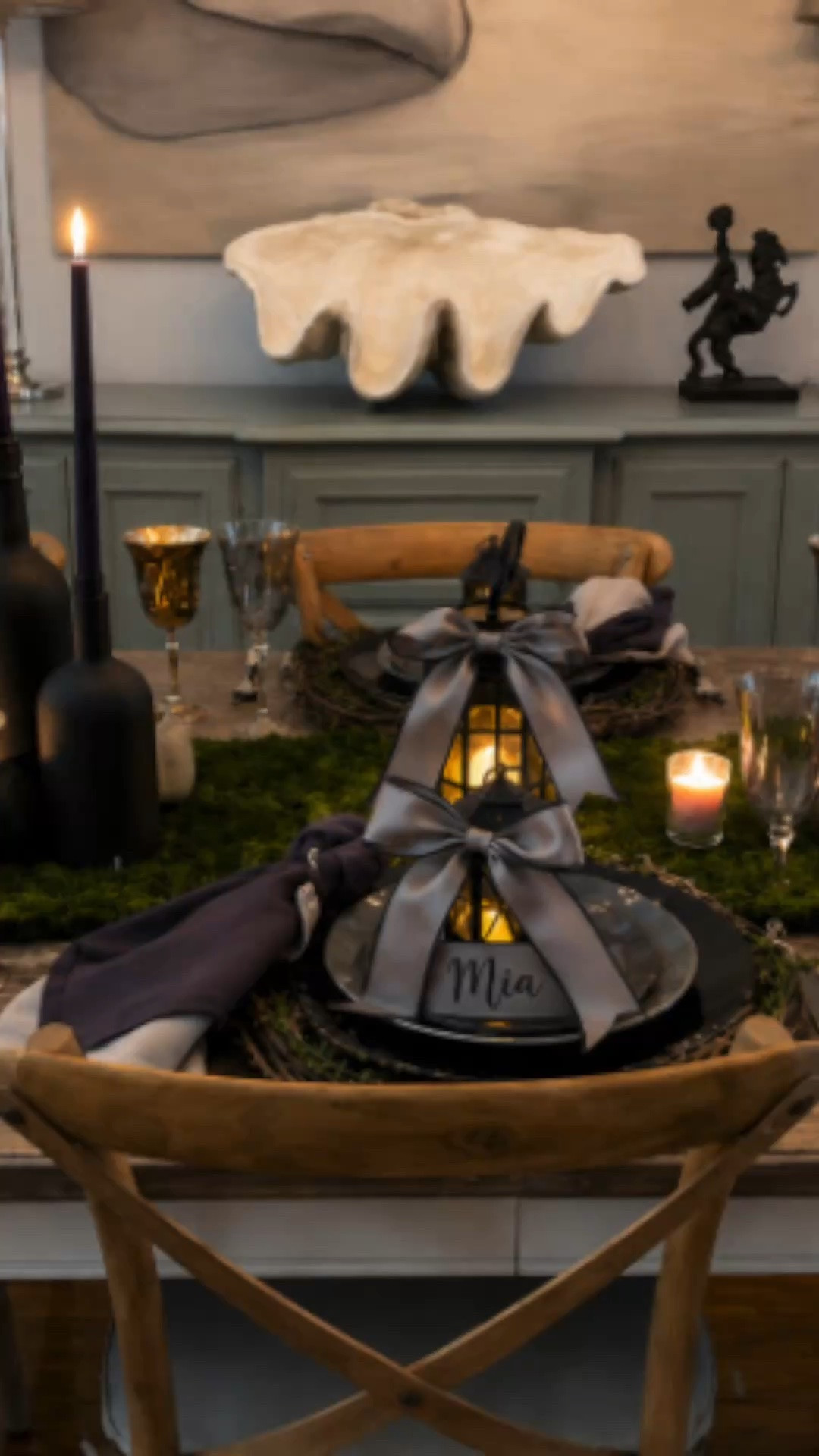 Creating a table is all about layering beautiful pieces that work together. ✨ From the lantern place cards and moss runner to the smoky gray napkins, candleholders, goblets, and dinnerware, every detail adds to the cozy, candlelit atmosphere. I've linked everything I could find so you can recreate this look or mix and match your favorite pieces to make it your own.

#LTKSeasonal #LTKHome