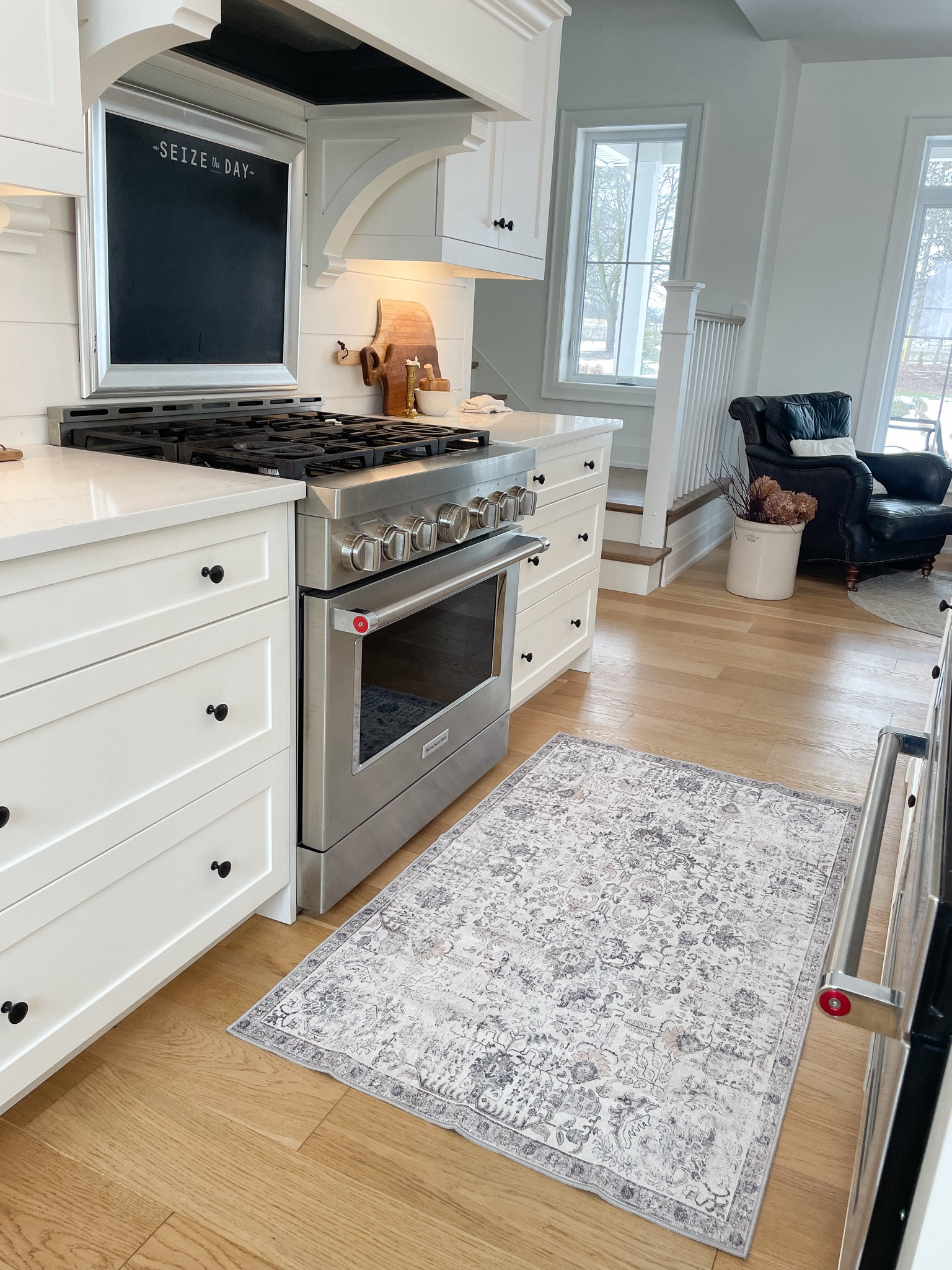 JUST ADD A RUG 
.
To add a cozy feeling to your white kitchen  🤍

#LTKhome #LTKstyletip