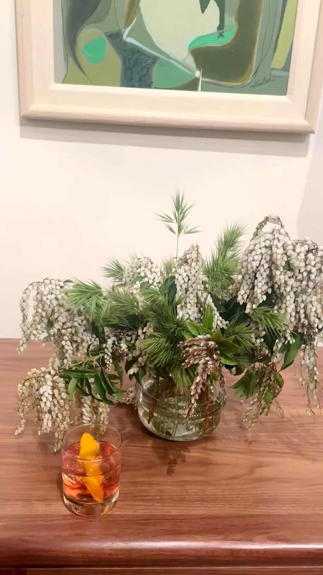 Cocktail moment — art on the wall, a beautiful floral arrangement, and an old fashioned, quietly styled. #CocktailGlass #Drinkware #Barware #WallArt #FloralArrangement #ArtfulLiving #StillLife #LTKHome

#LTKHome #LTKdayinmylife #LTKFestival