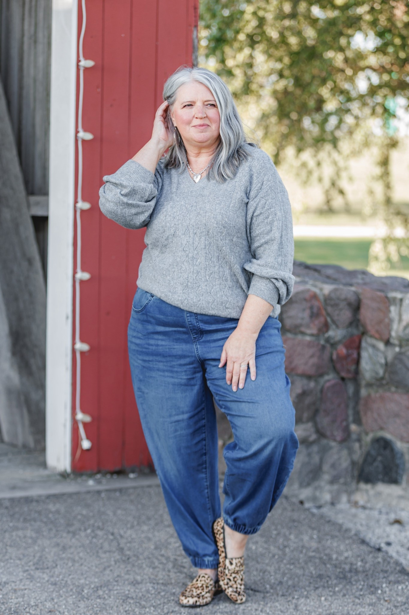 Lane Bryant knit denim joggers styled with leopard flats and a gray pointelle collared sweater. 
Jeans 16 
Sweater 14/16 

Measurements for size reference:
5’5” || Bust 44” || Waist 40” || Hip 52” 