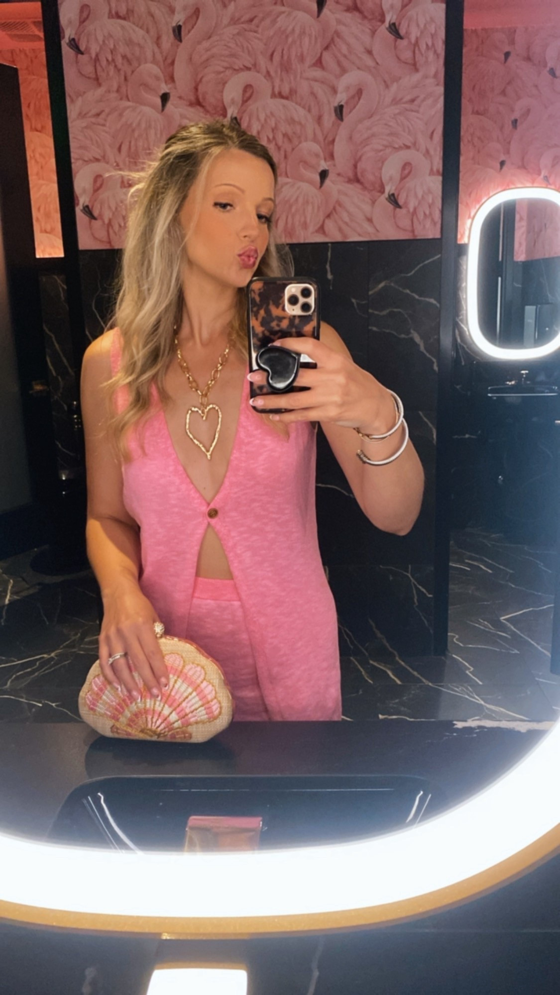 Pink skirt set & seashell clutch 💕

#LTKItBag #LTKStyleTip #LTKFindsUnder50