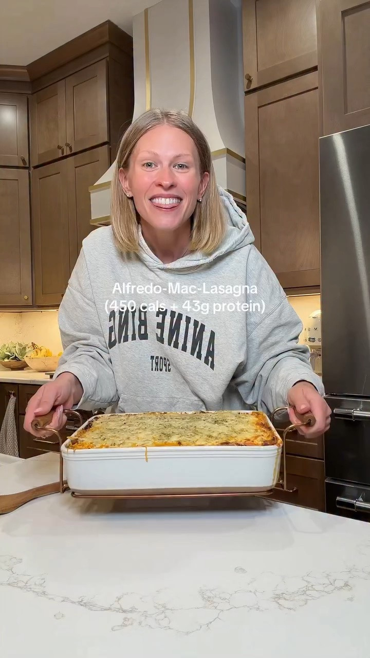 Alfredo-Mac-Lasagna (450 cals + 43g protein)🍝🥖 This recipe makes 12 servings: 
-1 diced carrot (large) 
-boil Brami Protein Pasta (12oz) in 32oz beef bone broth- add pasta directly into the bone broth and THEN bring to a boil to cook the pasta. 
- 1 container Rao’s Roasted Garlic Marinara (32oz) 
-2 pound, Lean Ground Beef
-1 tablespoon, chopped Garlic
-1 cup sliced mushrooms
-1 medium white onion, chopped.
-24 oz(s), Low-Fat Classic Cottage Cheese
-15 oz, part skim Ricotta Cheese
-1/2 cup, Classico Creamy Alfredo
-1 bag Kraft Fat Free Mozzarella shredded cheese 
-season well with Kinder’s Italian Herb, Red Wine Butter seasoning, Buttery Garlic Herb, salt, and pepper. 
Bake in a 9x13 casserole dish at 400 degrees for about 25 mins, broil the top until golden brown, and then cut into 12 servings! 
#protein #alfredo #mealprep #italian #easyrecipe