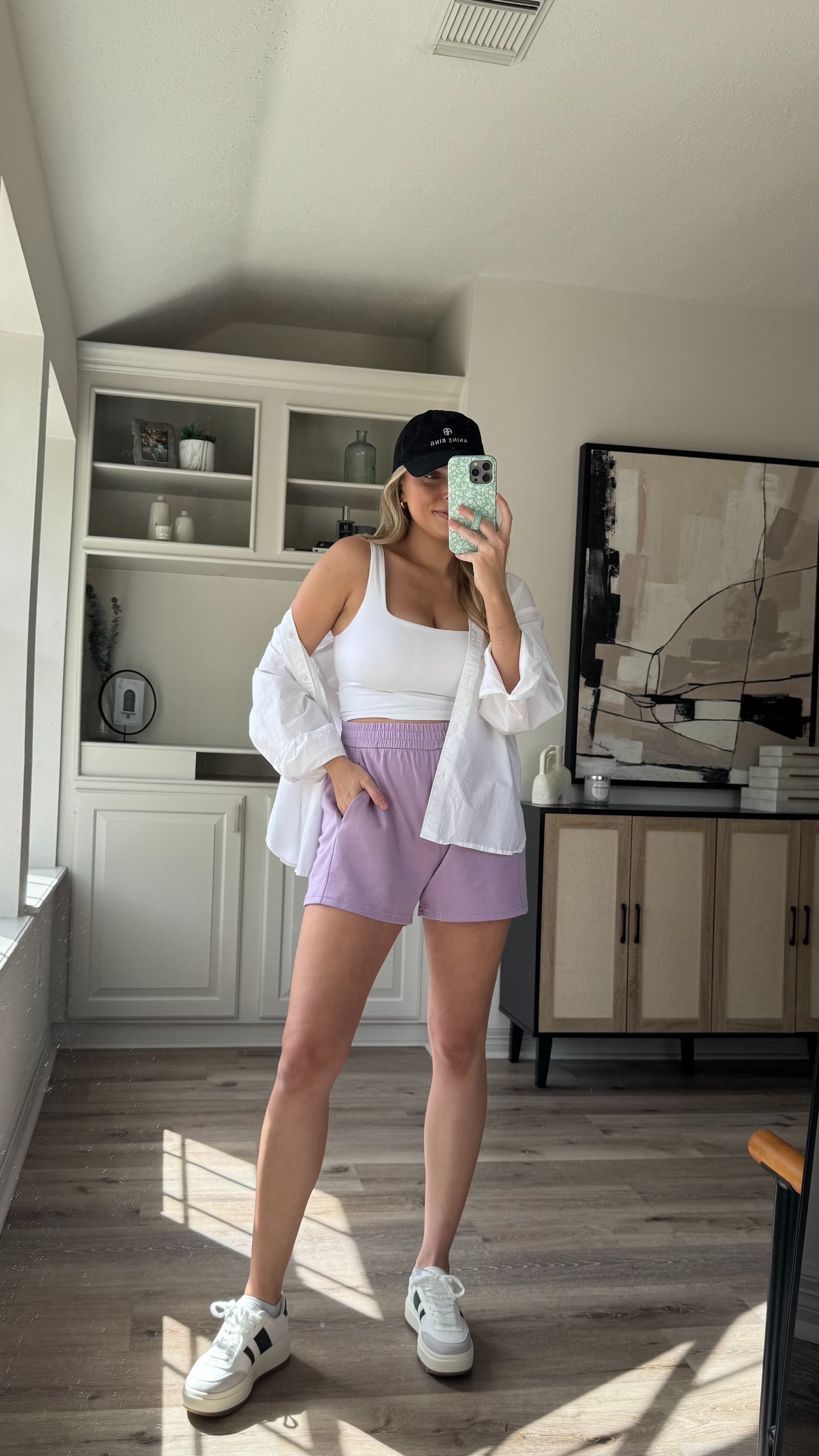 Athleisure Spring Outfit | I love these lounge shorts. So comfortable and come in several colors. Wearing size L in the shorts, size M in the botton up. Sneakers fit tts. 

 

#LTKActive #LTKStyleTip