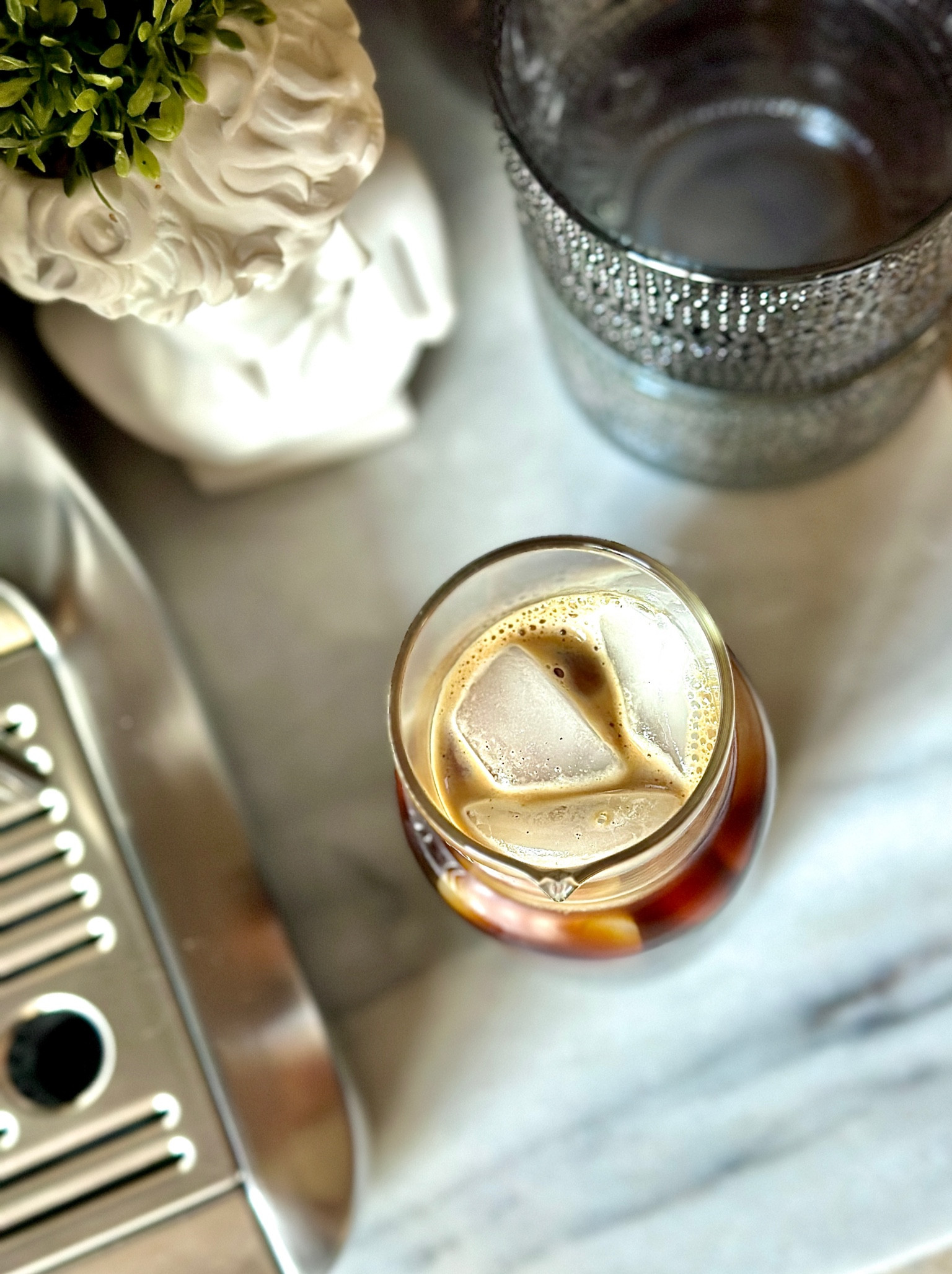 Happy Friday y'all ☕️ Love a slow Friday morning to ease into the last day of the week and get weekend ready! 

This morning's iced americano
-18g Starbucks espresso dark roast
-2 shot filter basket
-2:1 water ratio
-fill carafe with ice and water, brew espresso separately
-pour freshly brewed espresso over ice and water...enjoy!

Breville espresso machine // coffee station // coffee bar // coffee aesthetic // marble cutting board // vintage inspired coffee mugs

#LTKhome #LTKfamily