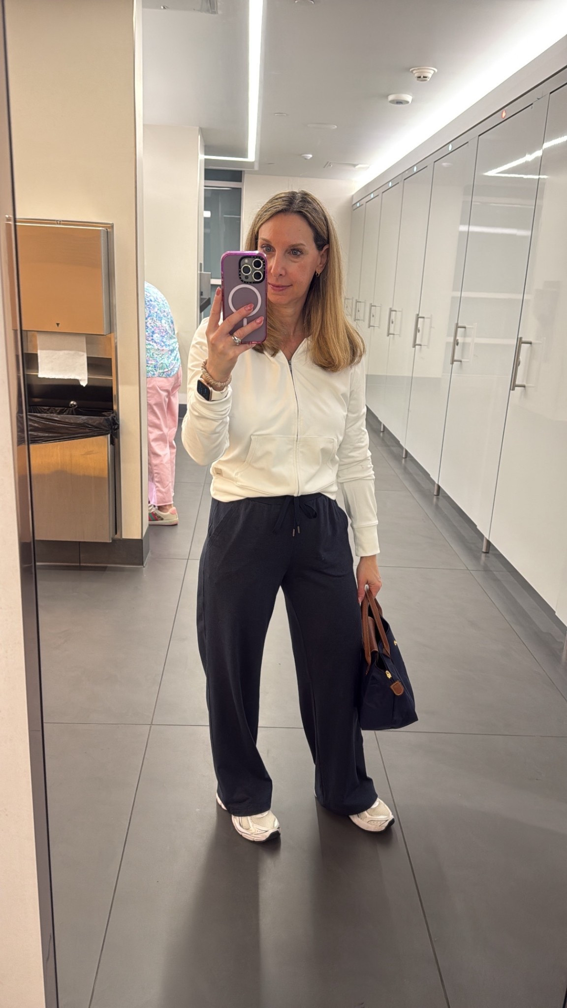 Travel ootd - almost identical to my previous travel outfit. Same hoodie, different color and different bag. Went old school with long champ handbag


#LTKootd #LTKOver40