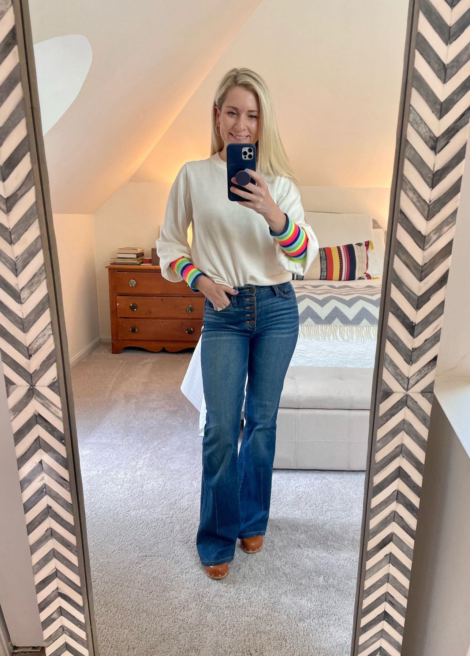 It’s Friday!!!!!! So happy weekend is right around the corner. Calls for a fun rainbow sleeved sweater. This Wispr top no longer available but linking similar below. And clogs for the win again with bootcut jeans!

#LTKhome #LTKFind #LTKsalealert