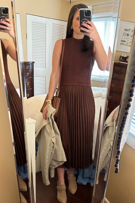 When you’re supposed to be packing for the holidays but end up trying on outfits that don’t work for occasions you have planned 🤷🏻‍♀️ I got this dress at a local boutique, Milla where it’s sold out, but I found it online and discovered that it was a dupe for a designer dress. I love the color of it and the way the pleated skirt looks with the sweater material top plus it’s the perfect weight for fall and winter in Alabama! I paired it with tan braided booties, a tan BB Dakota jacket, and brown Mango crossbody bag. 

Brown pleated dress, brown tank dress, sweater dress, work party, office party, date night dress, starburst earrings, mango bucket bag, tan dolce vita braided booties 

#LTKSeasonal #LTKfindsunder50 #LTKfindsunder100