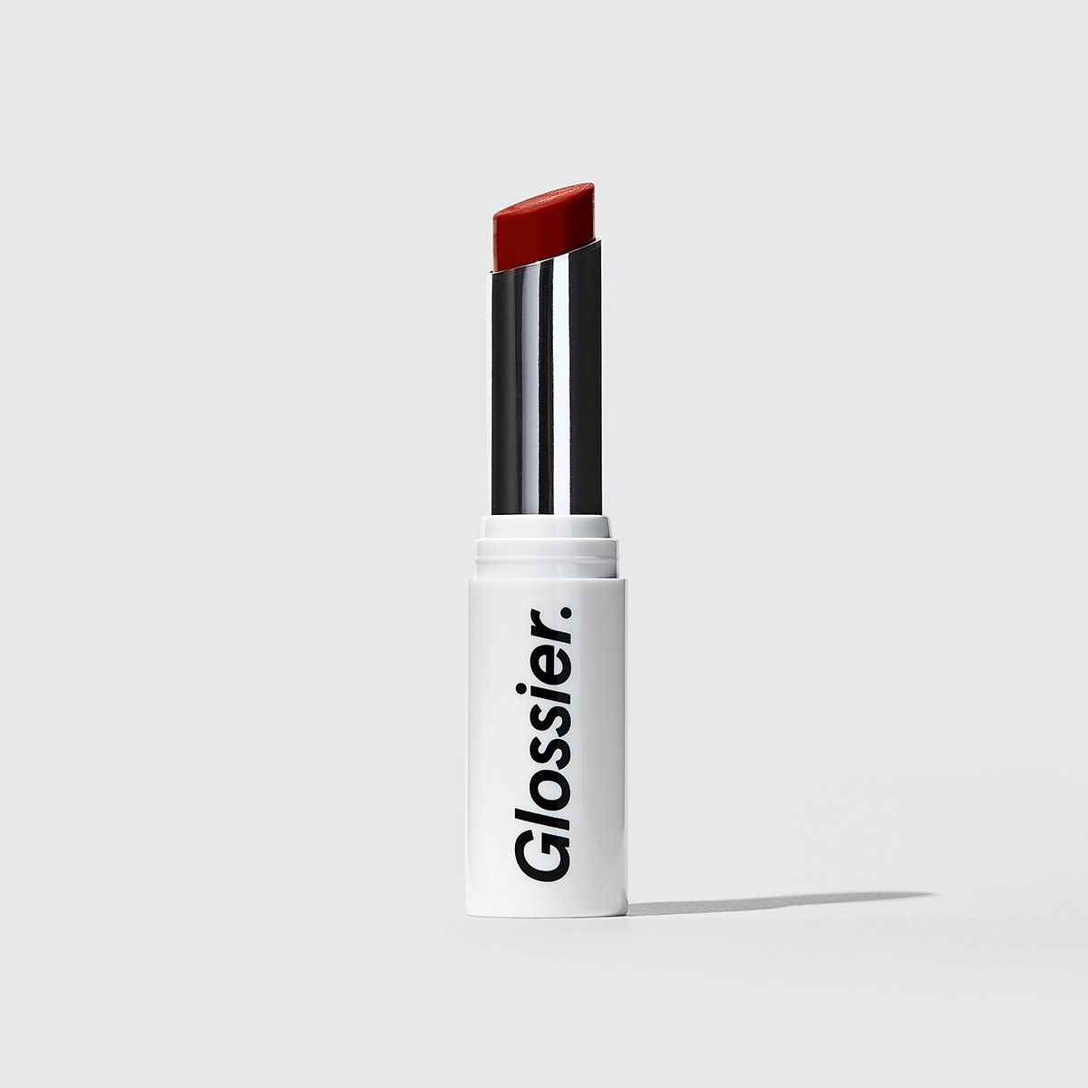 Glossier Generation G Lipstick in Jam, a deep berry magenta, 0.07 oz, enhancing sheer matte lipstick that adapts to you | Glossier