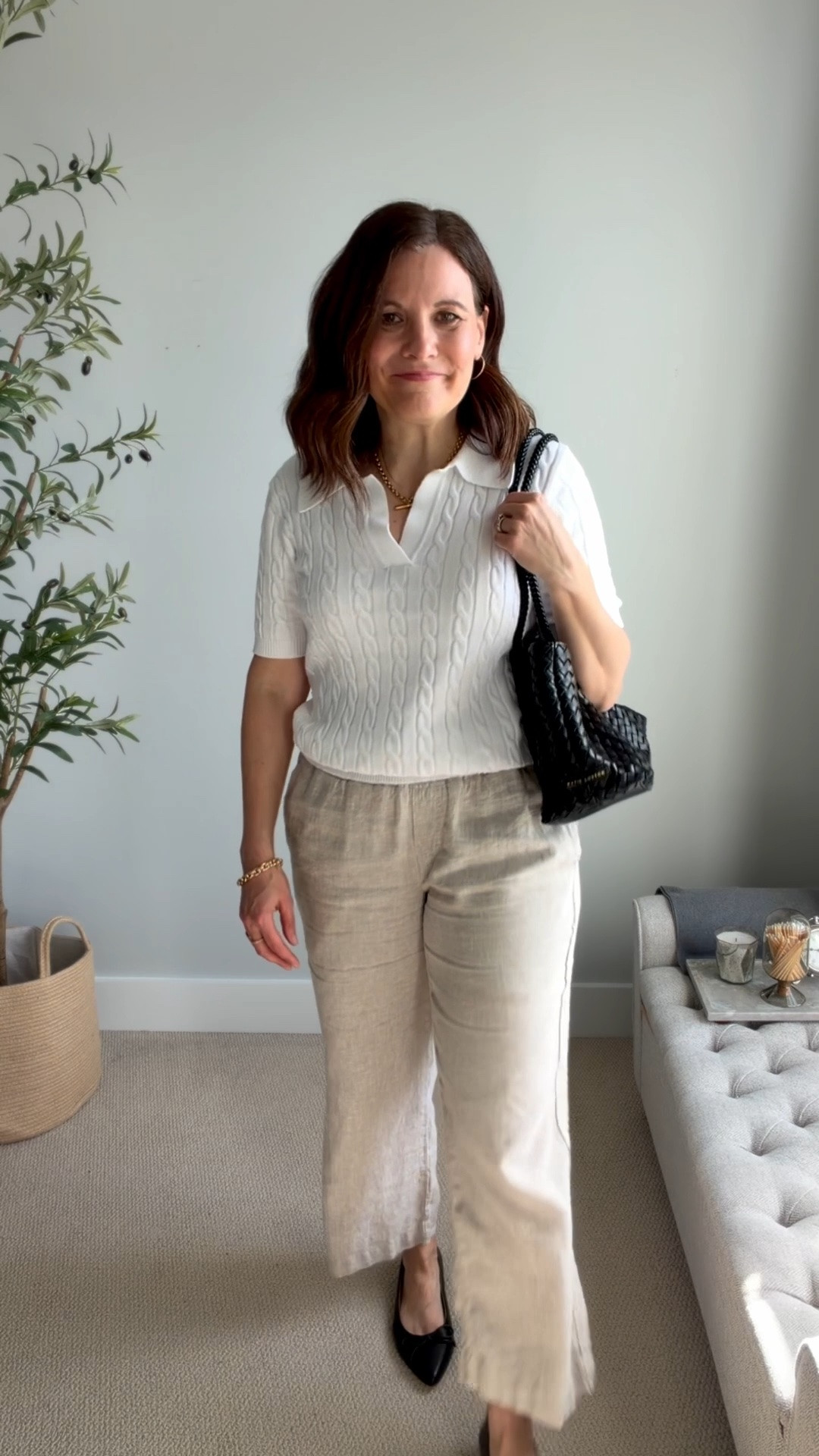 A white-collared cable-knit sweater is one of the easiest ways to dress up khaki linen pants for work. The collar adds just enough structure to elevate the outfit.
These wide leg linen pants fit her a size I’m in a medium in the 28 inch inseam. ￼

#LTKMidsize #LTKOver40 #LTKSaleAlert