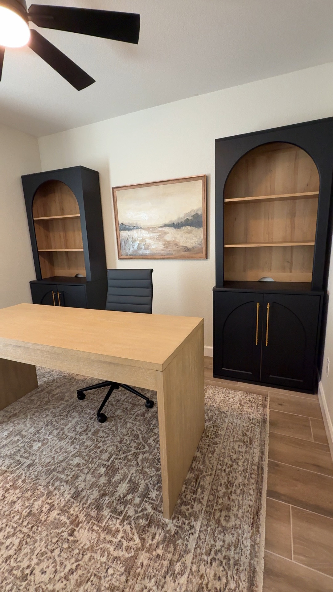 Part 1 of our home office makeover! 

I love this timeless neutral vibe for an office. It’s perfect for a women’s office or men’s office. Work from home never looked so good!! 
•
•
Neutral office, moody office, home office, wfh, work from home, oak desk, wood desk, writing desk, office chair, grey curtains, dark linen curtains, twopages curtains