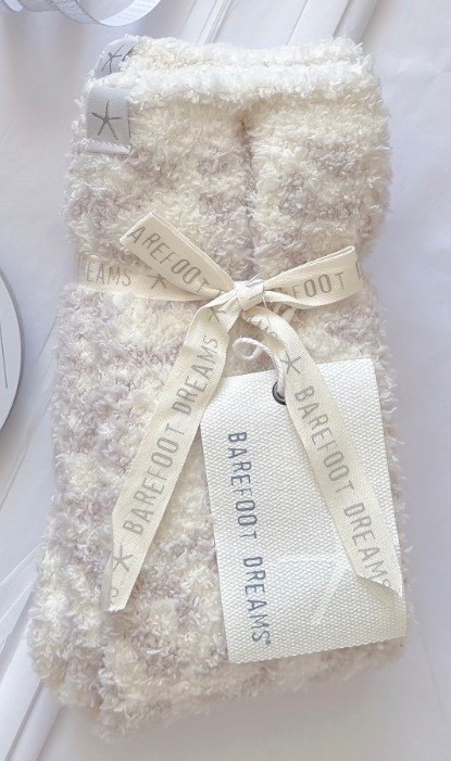 I have been living in these Barefoot Dreams socks since Christmas! And, I am not a big sock around the house person! Or I wasn’t 😉

They are the coziest comfiest socks I’ve ever put on! Not tight in anyway! Just the right amount of loose. I forget I have them on! The Leopard print is subtle & chic! 