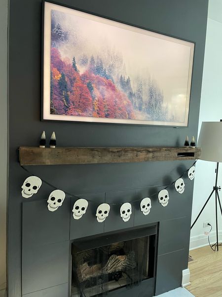Simple Halloween decor for tbt living room mantle 💀

#LTKHalloween #LTKhome #LTKSeasonal
