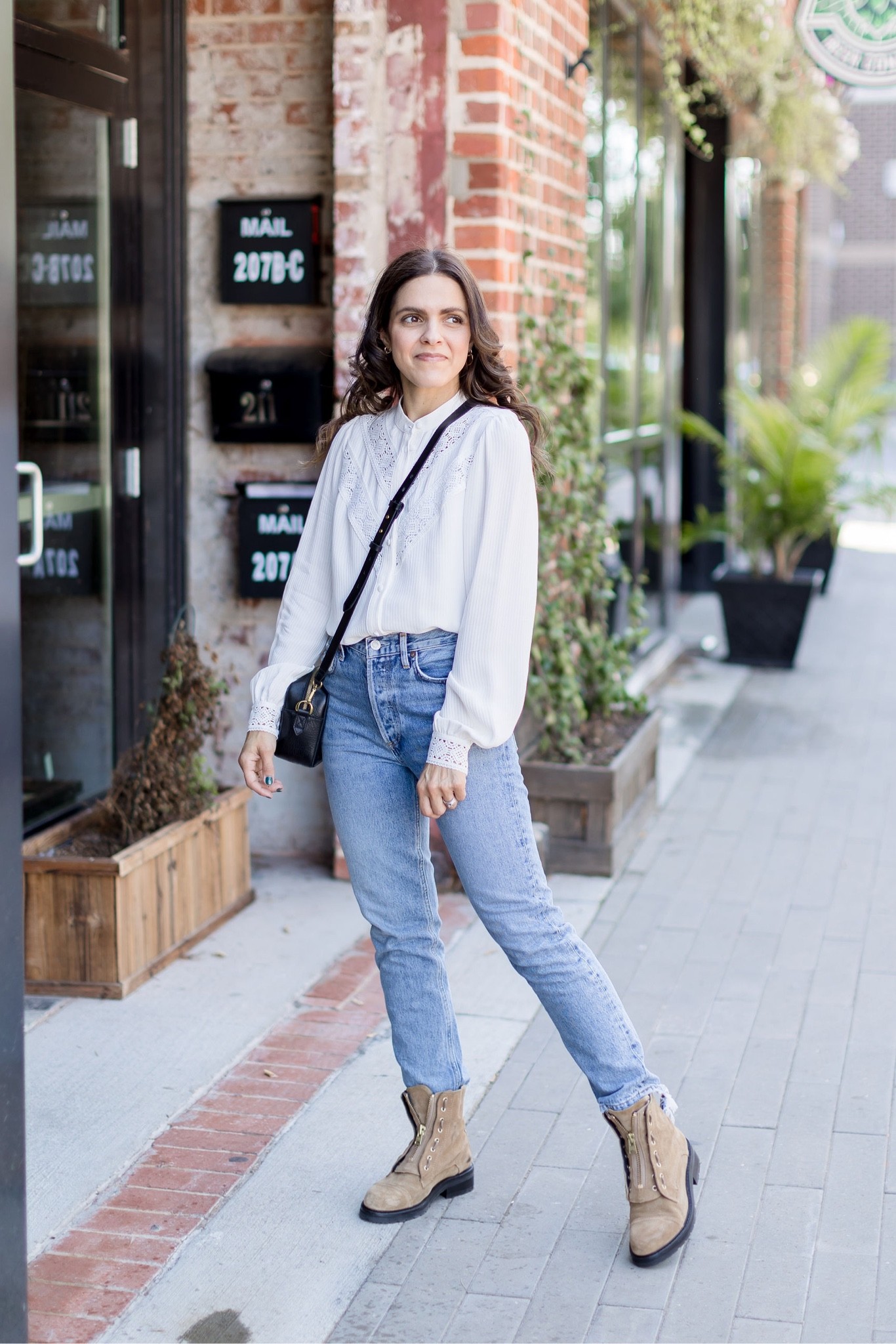 Fall capsule wardrobe outfit idea: white Sezane blouse (tts), Agolde Riley crop jean (tts), combat boot, camera crossbody bag 

#LTKstyletip #LTKSeasonal