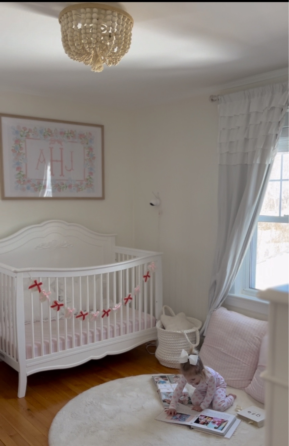 There’s no better time than Valentines Day to make some girly updates to Ava’s room! Pottery barn chandelier, ruffle curtains, baby book, bonnet, fuzzy rug, heart banner, scallop crib, monogram picture 

#LTKHome #LTKBaby #LTKKids