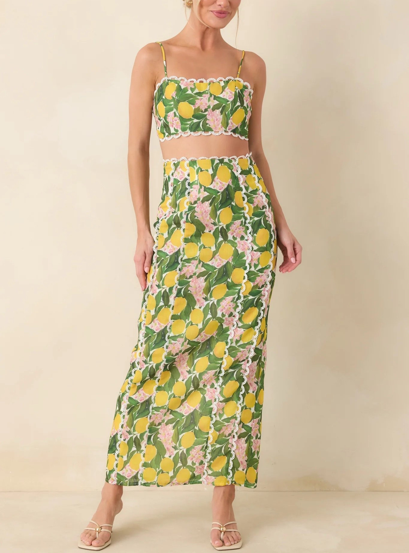 Meet the top that tastes like sunshine. The Sweetest in the Grove Yellow Multi Lemon Blossom Crop Top is equal parts flirty and feminine, with its delicate lace trim and vibrant citrus print that feels straight out of an Italian summer. Top is under $60; Skirt is under $80.

Keywords: Wedding guest dress, two-piece set, maxi skirt, crop top, summer dress, spring wedding, summer wedding, spring wedding guest, vacation outfits, vacation dress, garden party, cocktail party, Easter dress, Easter outfits, resort outfits 2026, summer wedding guest, day date, date night, European trip, Italy vacation, floral print dress, lemon print dresss

#LTKTravel #LTKgrwm #LTKWedding