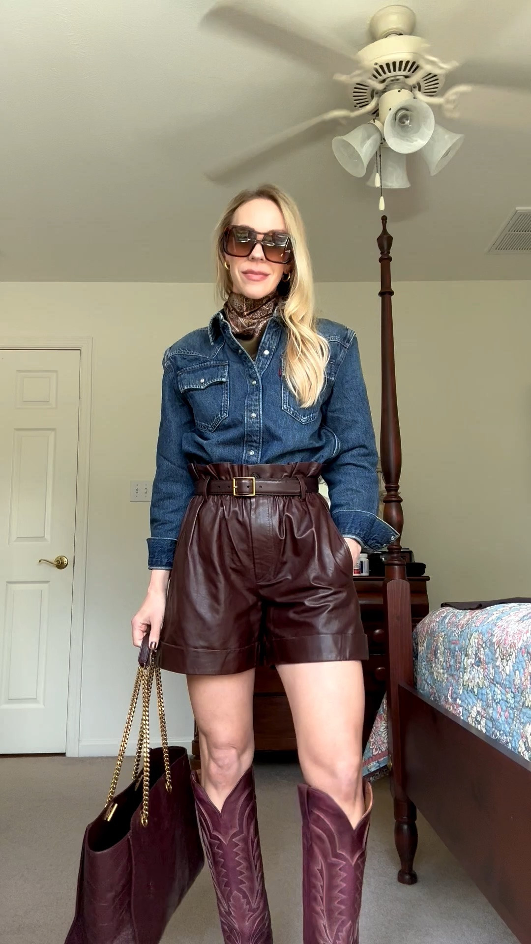 Western chic, paisley silk scarf, @levi shoulder pad denim shirt, leather shorts with boots, @Tecovas burgundy cowboy boots

#LTKSeasonal #LTKOver40 #LTKootd