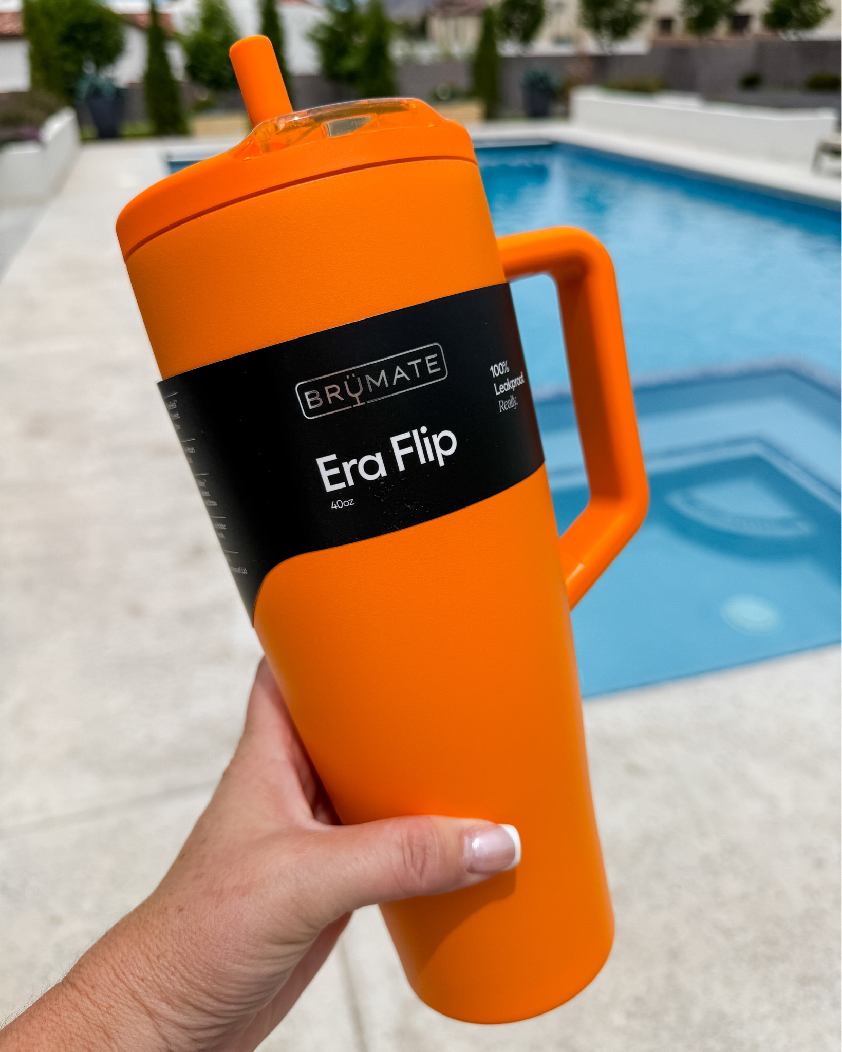 Loving this new arrival Brumate Era Flip 40oz in Clementine. Now I'm ready to fill it with my favorite drink and a book for a pool day!

#LTKSeasonal #LTKHome