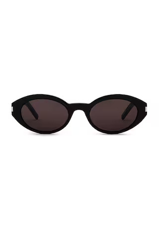 Saint Laurent Oval Sunglasses in Black | FWRD | FWRD 