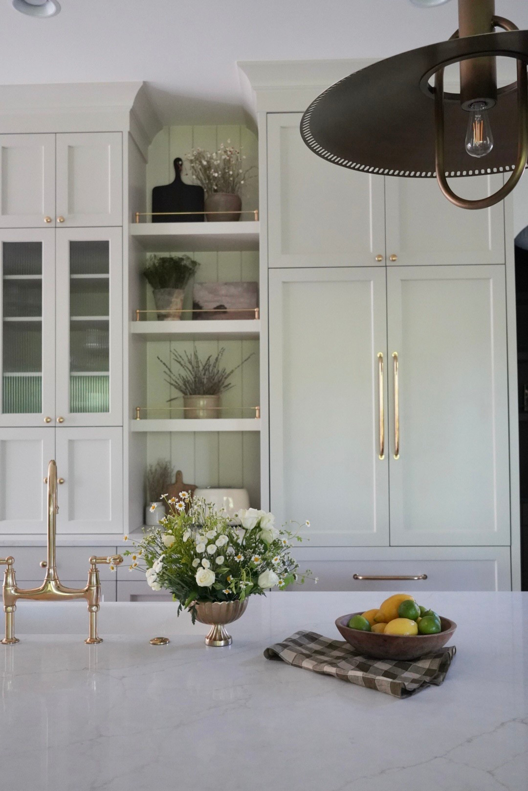 Kitchen links, cabinet hardware, sink, lights and railing. 

🤎Hardware finish: Unlacquered Brass 
🤎Cabinet paint:  Natural Cream by Benjamin Moore 
🤎Countertops: Luce Cascade Quartz

#LTKStyleTip #LTKHome