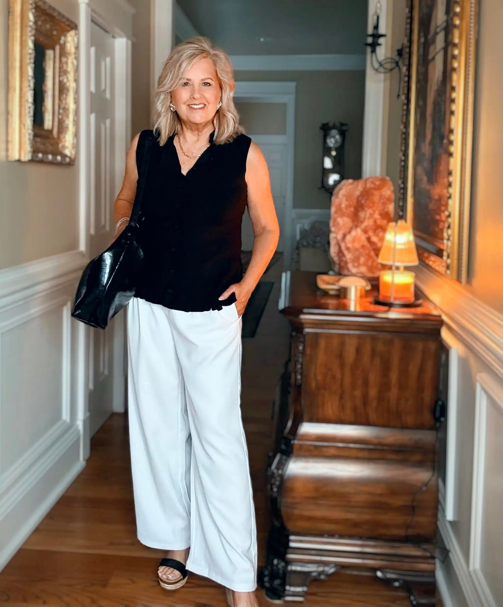 A classic black and white outfit that’s great for Spring! Both pieces are Amazon finds and come in multiple colors. I am wearing a size large in the top and wide leg pants. 

#LTKOver40 #LTKWorkwear #LTKootd