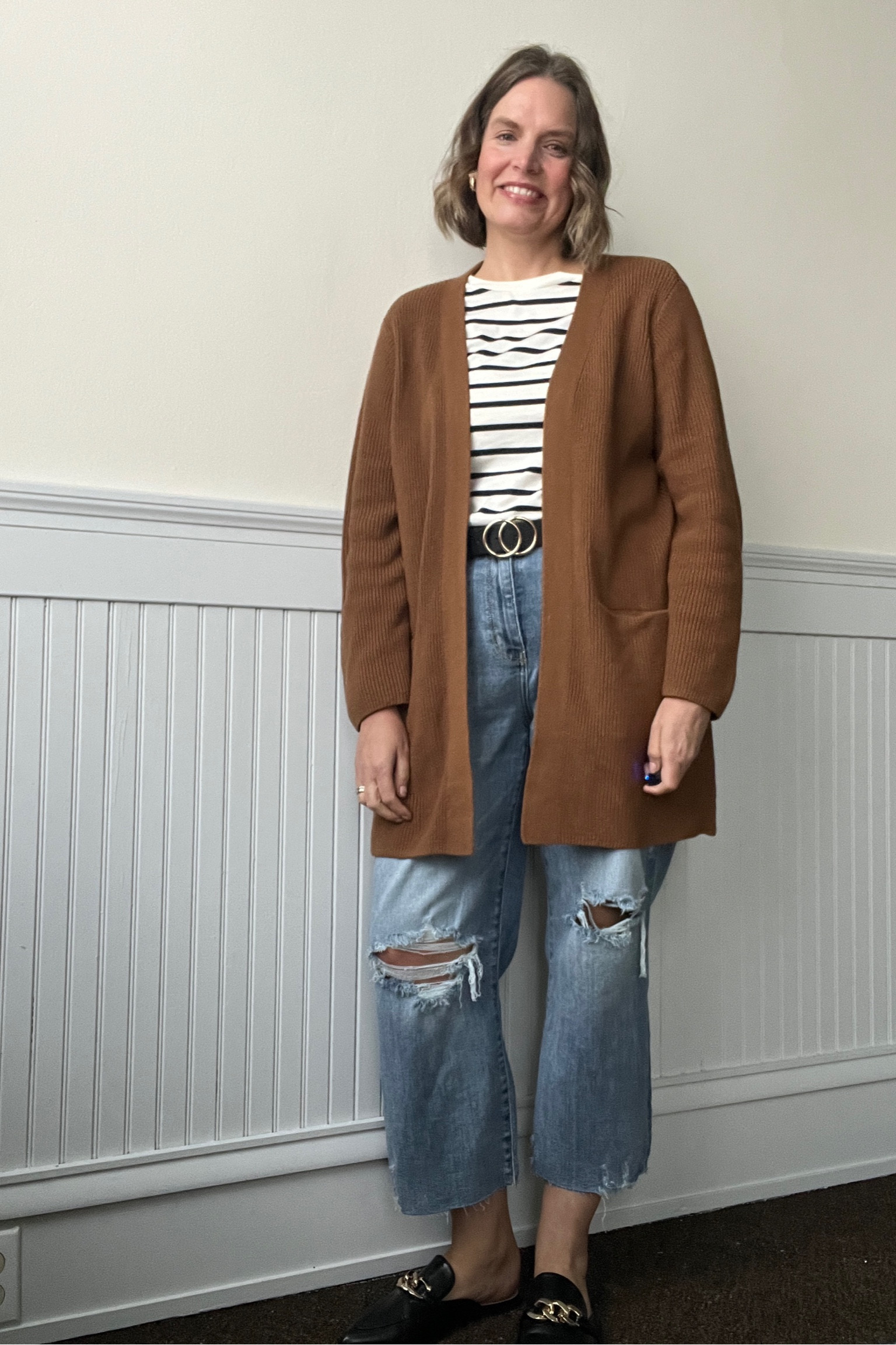 Outfit code: cardigan + striped shirt + distressed denim + black slides


#LTKmidsize #LTKover40 #LTKSeasonal