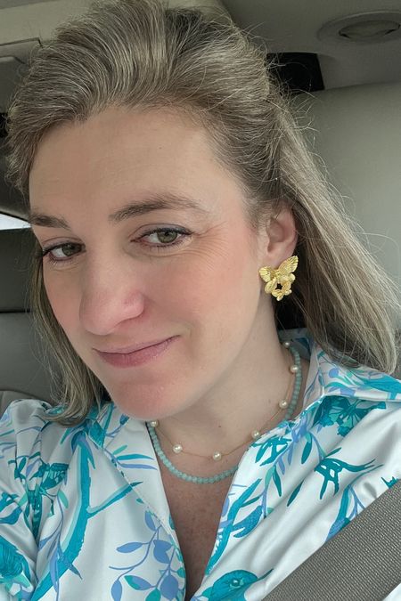 A mix of several
Jewelry brands but I love it! My pearl necklace was a high school graduation gift and still available—invest in the classics! Adding a pop of color with the turquoise beaded necklace and love these gold butterflies! 