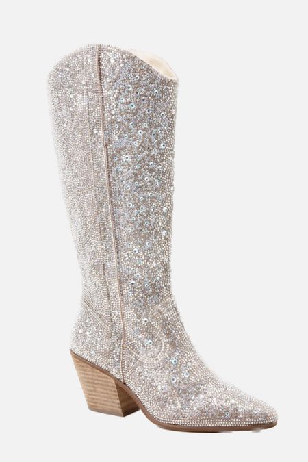These sparkly cowboy boots make such a statement! 

I always size up a half size for pointed toe shoes. 

#LTKshoecrush