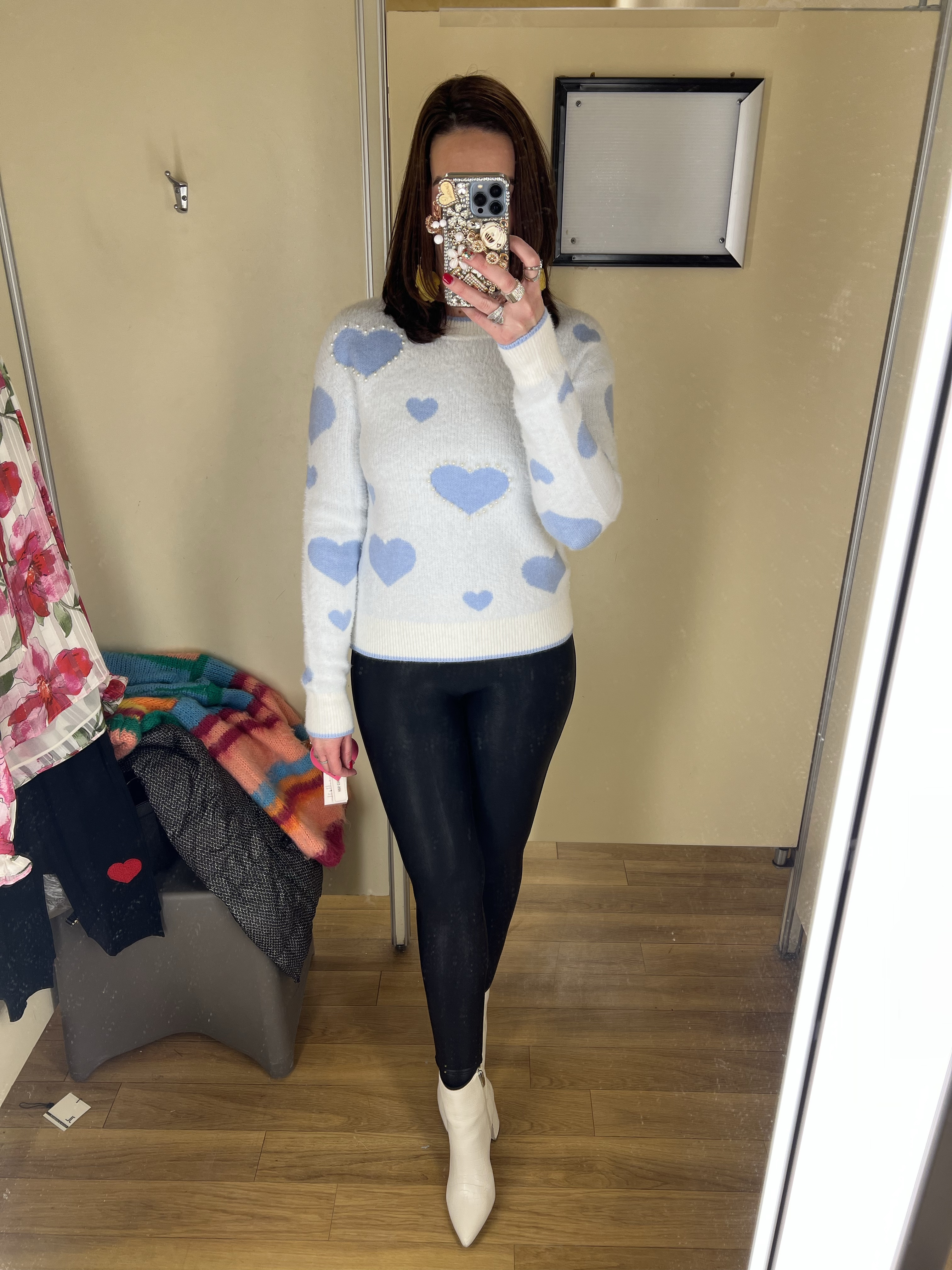 Blue heart sweater (small). Black faux leather leggings (small). White boots (8.5). #sweater #sweaters #bluesweater #blackleggings #leggings #fauxleatherleggings #whiteboots #boots #winteroutfit #valentinesdayoutfit 
Valentine’s Day Outfit 
Winter Outfit

#LTKFindsUnder100 #LTKStyleTip #LTKSeasonal
